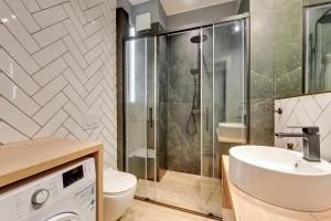 Koupelna v ubytování Comfort Apartments Granaria