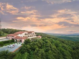 an aerial view of a house on a hill at Zaara Estate Winery Hotel & SPA in Glavan
