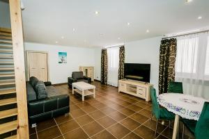 Μια τηλεόραση ή/και κέντρο ψυχαγωγίας στο Apartament MICKIEWICZA