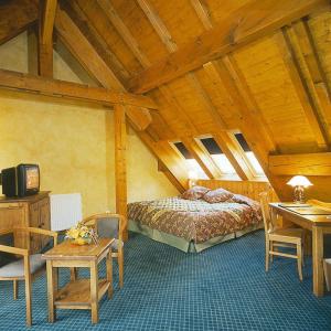 Postel nebo postele na pokoji v ubytování Lautaret Lodge & Spa