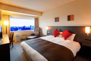 מיטה או מיטות בחדר ב-Century Royal Hotel Sapporo