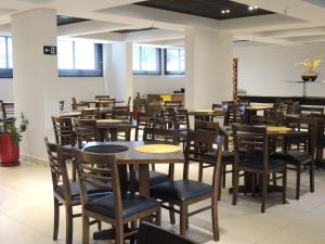 欧西塔诺阿帕特酒店餐厅或其他用餐的地方