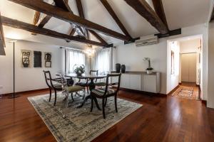 A kitchen or kitchenette at San Pantalon Luxury Penthouse R&R