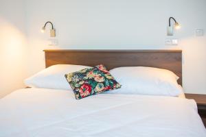 Letto o letti in una camera di Hotel Olympionik