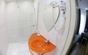 Kylpyhuone majoituspaikassa Hotel Phenix