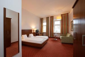 Fotografie z fotogalerie ubytování Keramikhotel Goldener Brunnen v destinaci Gmunden + 28 fotografií