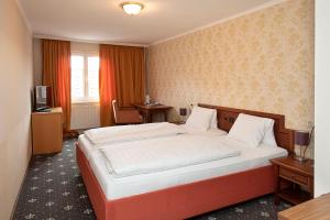 Fotografie z fotogalerie ubytování Keramikhotel Goldener Brunnen v destinaci Gmunden