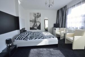 Llit o llits en una habitació de Penzion Best