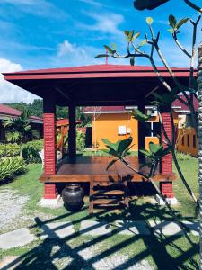 Zahrada ubytování Chuu Pun Village Resort + 56 fotografií