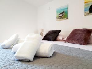 Postel nebo postele na pokoji v ubytování Apartman Šime