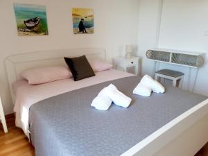 Postel nebo postele na pokoji v ubytování Apartman Šime