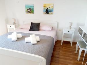 Postel nebo postele na pokoji v ubytování Apartman Šime