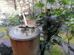 Taman di luar 京都二条城近く京町屋120年の歴史に泊まる