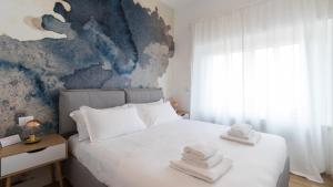 Italianway - Brianza 28 tesisinde bir odada yatak veya yataklar