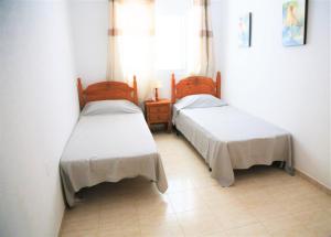 A bed or beds in a room at Edam apartment