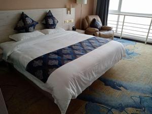 Кровать или кровати в номере Demei Boutique Hotel