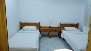 Ένα ή περισσότερα κρεβάτια σε δωμάτιο στο Pine tree house