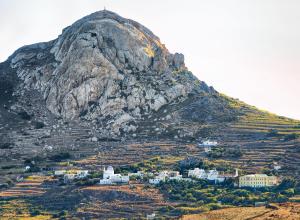 a mountain with a town in front of it at Xinara House Old Blacksmiths in Tripótamos