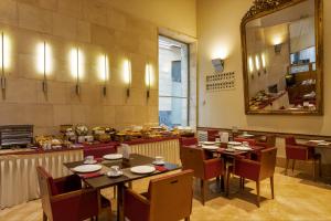 Restaurant o un lloc per menjar a Sercotel Palacio de Tudemir