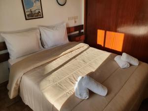 Voodi või voodid majutusasutuse Residencial Campo-Mar by Umbral toas