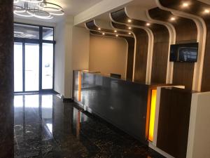 TV a/nebo společenská místnost v ubytování Sette Serenity Hotel