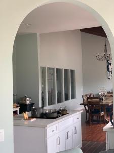 a kitchen with a counter with pots and pans at Rancho Garden Home in Rancho Santa Fe