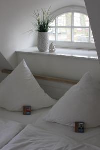 Katil atau katil-katil dalam bilik di Traditionelles Reethaus direkt an der Ostsee