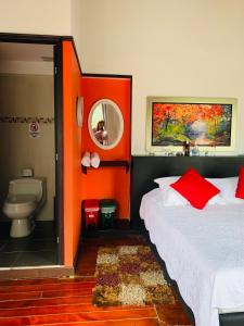 Llit o llits en una habitació de Hotel Lleras Premium #1