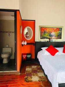Postel nebo postele na pokoji v ubytování Hotel Lleras Premium #1