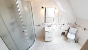 Kúpeľňa v ubytovaní BTHouse, Pokoje Gościnne