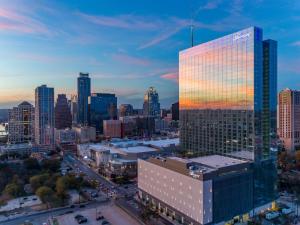 a view of a city skyline with a tall building at Fairmont Austin in Austin +196 photos