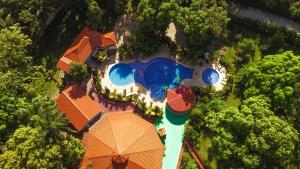 an overhead view of a resort with a swimming pool at Auberge Villa Cana in Cap-Haïtien