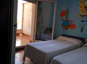 Posteľ alebo postele v izbe v ubytovaní Apartamento Balboa1