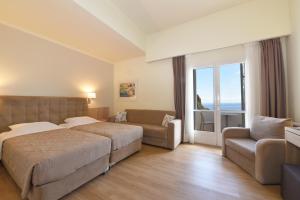 Voodi või voodid majutusasutuse Hotel Hermes toas