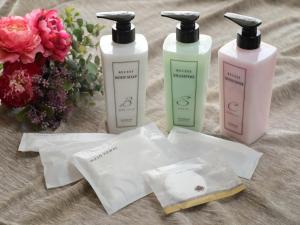 a group of three bottles of soap and flowers at Garden hotel Shiunkaku Higashimatsuyama / Vacation STAY 77481 in Higashimatsuyama +4 photos