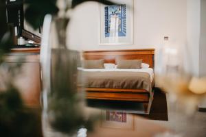Łóżko lub łóżka w pokoju w obiekcie Hotel Villa Eugenia
