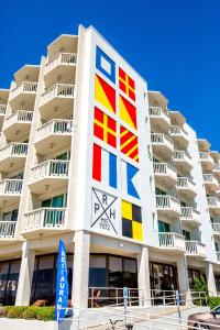 a building with a colorful mural on the side of it at Port Royal Oceanfront Hotel in Wildwood Crest