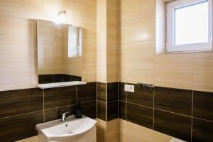 Koupelna v ubytování Jazmin apartmány + 25 fotografií