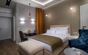 Postel nebo postele na pokoji v ubytování Beys Palace apartments Sarajevo