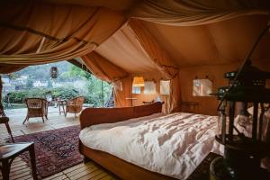 Postel nebo postele na pokoji v ubytování Moselglamping