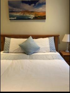 Uma cama ou camas num quarto em Burnham View