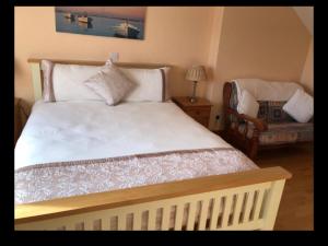 Uma cama ou camas num quarto em Burnham View