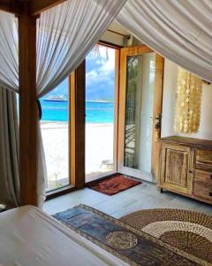 Voodi või voodid majutusasutuse Samura Maldives Guest House Thulusdhoo toas
