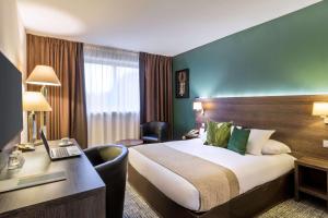 Voodi või voodid majutusasutuse Best Western Plus Hotel Admiral toas