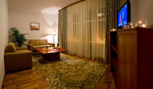 TV a/nebo společenská místnost v ubytování Hotel Re Vita
