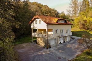 an aerial view of a house with a balcony at Kuća za odmor „VILLA MARIJA” in Kostel