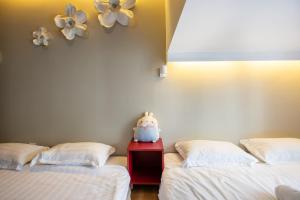 The Loft at Midhills Genting Highlands Free WiFi客房内的一张或多张床位