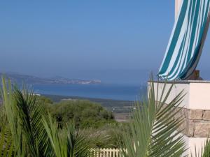 a view of the ocean from a building at Casa vacanze "La Caldosa" in Badesi