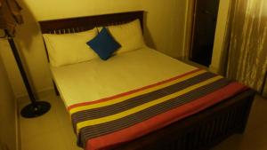 Cama ou camas em um quarto em BED & BICYCLE HOSTEL DAMBULLA