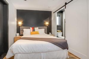 Postel nebo postele na pokoji v ubytování Motel Lévis